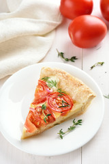 Slice of tomatoes pie