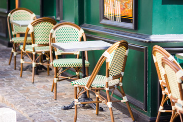 Fototapeta na wymiar Summer empty outdoor cafe at tourist european city