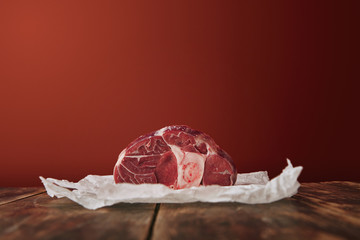 Presentetion raw angus leg steak craft paper