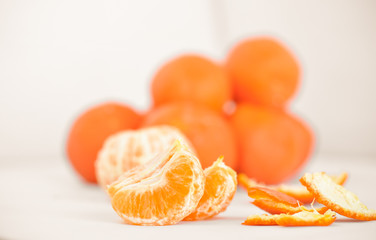 Ripe mandarin close up on a white background. Tangerine orange on a white background