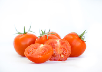 Fresh ripe cherry tomatoes isolated in white.