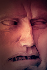 Sculpture - the evil face of a man
