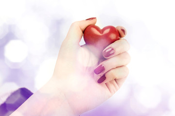 stone heart in hands for lovers and valentine