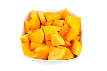 chopped butternut squash in white bowl