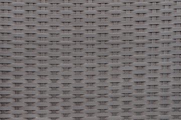 Woven plastic wicker pattern for background