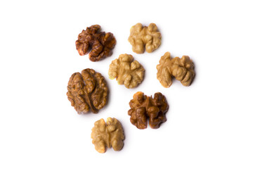 halves of a walnut isolated on a white background.