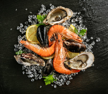 Seafood served on black stone
