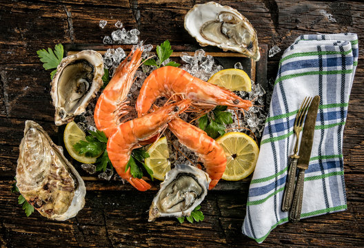 Seafood served on black stone