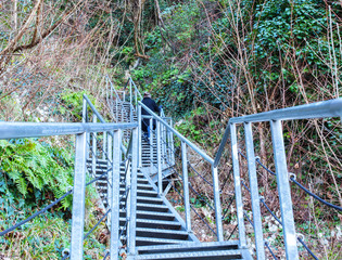 Iron staircase and a girl on her.