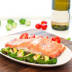 Piece of roasted salmon fillet with grilled vegetables. Square i
