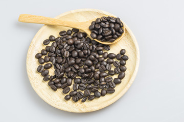 coffee bean in wood plate