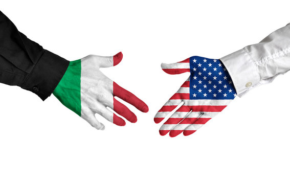 Italy and United States leaders shaking hands on a deal agreement