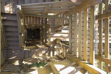 View down a wooden spiral staircase - canopy trail