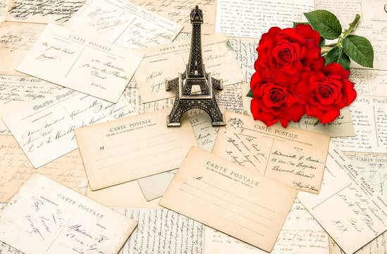 Red roses, old letters, Eiffel Tower from Paris