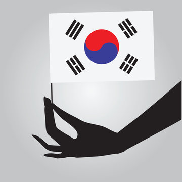 Hand with flag South Korea