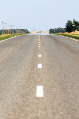 Road with a marking on the nature background