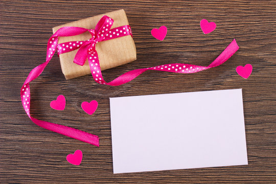 Gift with ribbon and love letter for Valentines Day, copy space for text