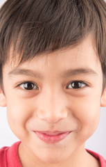 Obraz premium Close up face with smiling kid portrait