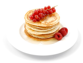 Pancakes con miele e frutti rossi