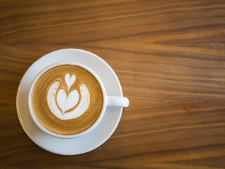 Hot coffee with latte art background, background concept.