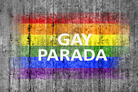 Gay Parada and LGBT flag painted on background texture gray concrete