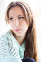Fototapeta premium Beautiful young woman close up face portrait
