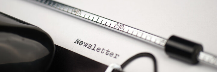 Newsletter text on retro typewriter