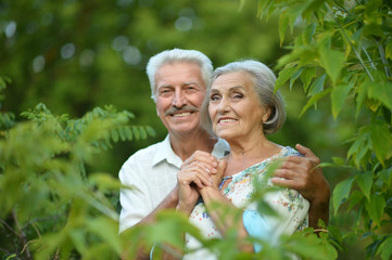 mature couple on in summer park