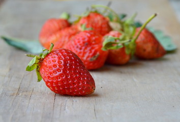 strawberry on wooden board