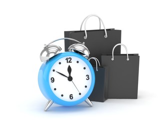 alarm clock and shopping bag (time to buy concept)