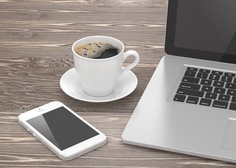 Obraz na płótnie Canvas Laptop smartphone and coffee cup