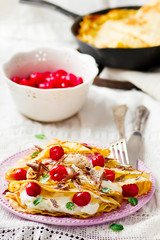 France  pancakes with cherry and cottage cheese