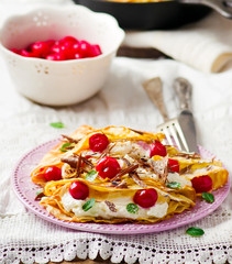 France  pancakes with cherry and cottage cheese