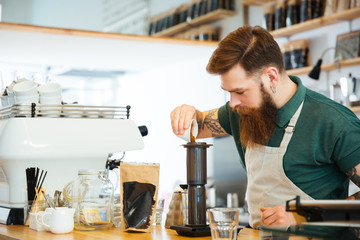 Barista making coffee