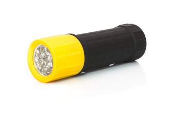 black and yellow flashlight on a white background