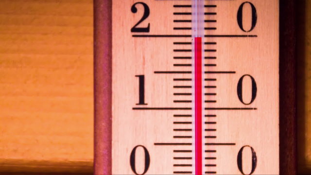 Temperature increases on a thermometer