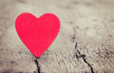 Fototapeta premium Red heart on wooden background