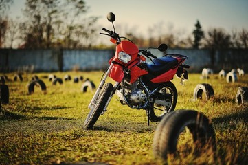 Enduro motorcycle stay on sunset sunshine