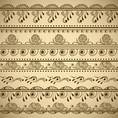 Vector set of hand drawn borders in ethnic indian style. Collection of pattern brushes inside