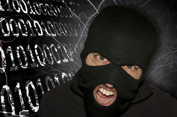 Man in a mask and a black shirt. Balaclava.