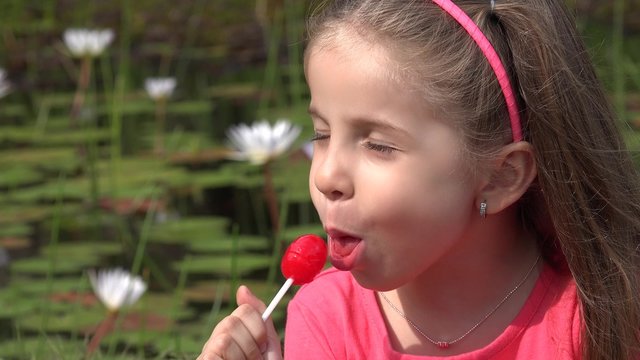 Toddler Girl With Lollipop