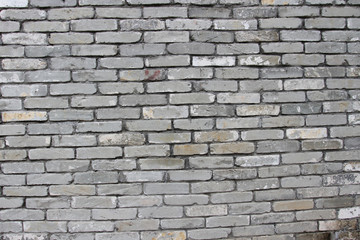 Light-colored brick wall