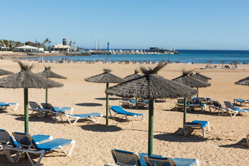 Sun lounger on the beach of Caleta de Fuste, Canary Island Fuerteventura, Spain