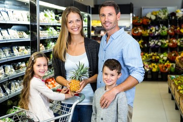 Portrait of family doing shopping 