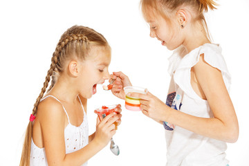 Little girls eating jello