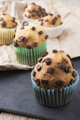 muffins with chocolate on a stone tray