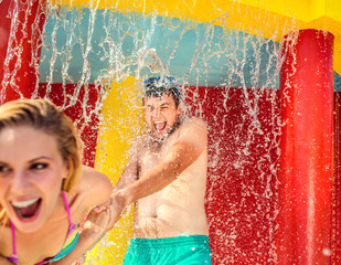 Beautiful couple in the swimming pool