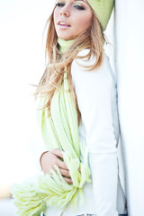 Beautiful woman with a green scarf 
