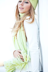 Naklejka premium Beautiful woman with a green scarf 