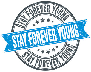 Fototapeta premium stay forever young blue round grunge vintage ribbon stamp